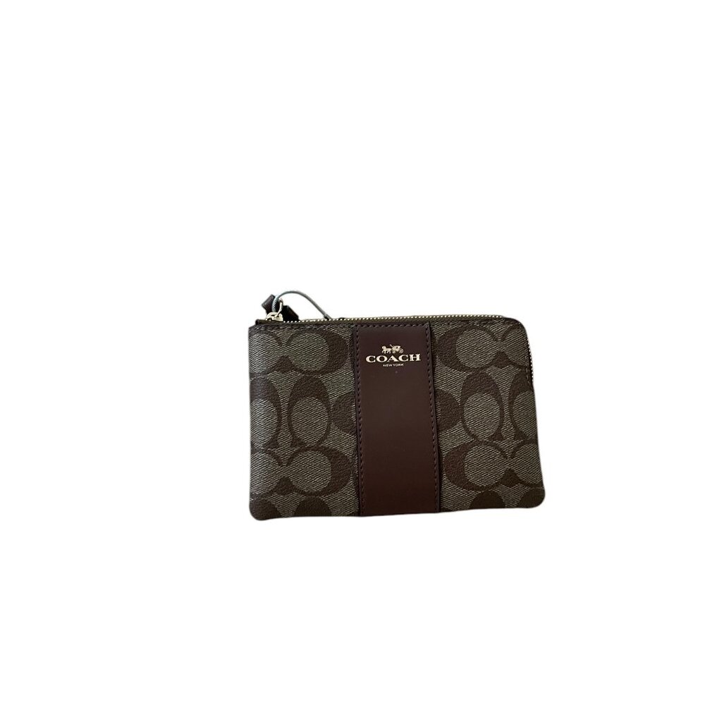 Wristlet Designer By Coach, Size: Medium